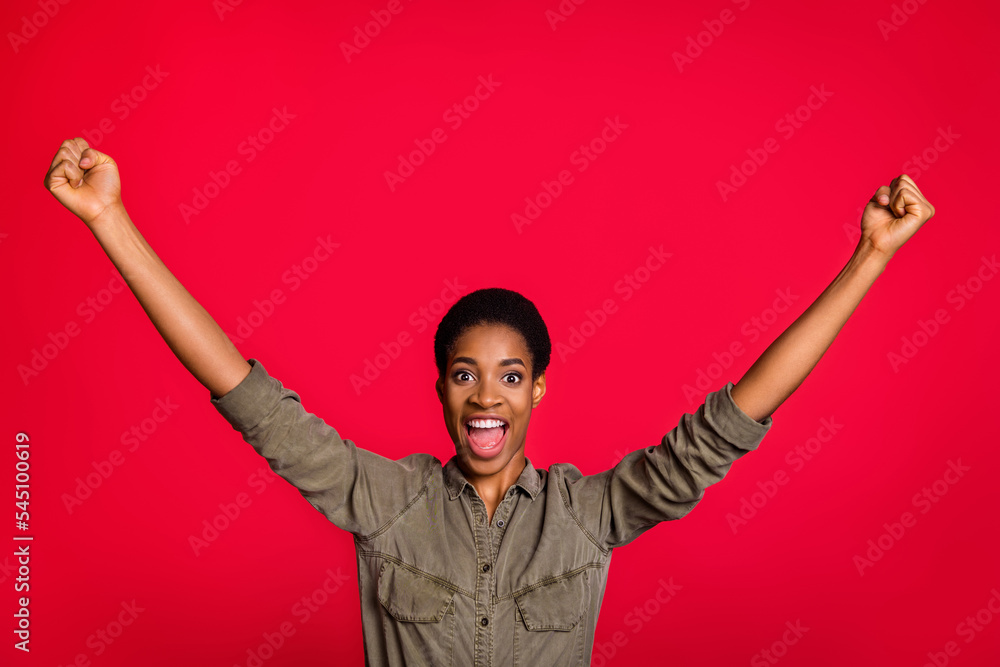 Photo of male lady celebrate achieve identity fist up wear smart casual khaki shirt isolated bright color background Photo of male lady celebrate achieve identity fist up wear smart casual khaki shirt isolated bright color background