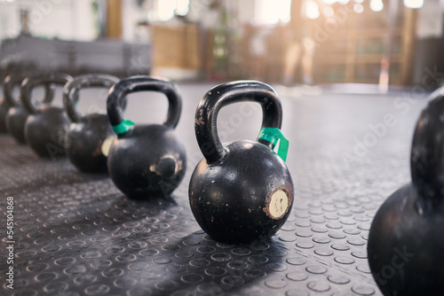Fitness  crossfit or zoom of kettlebell in gym or New york studio for weightlifting exercise  muscle development or wellness workout. Metal  steel or heavy iron for health  training or sports goal