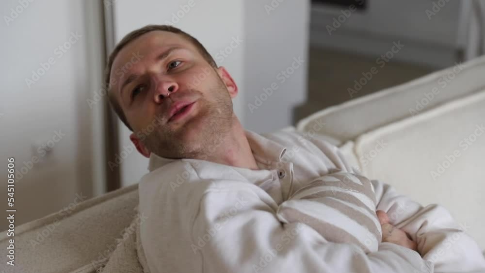 Young man hanging out on the couch Young man hanging out on the couch