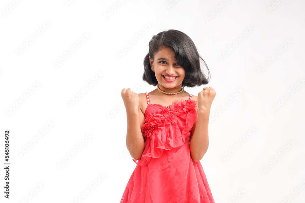 Cute indian little girl giving expression on white background Cute indian little girl giving expression on white background