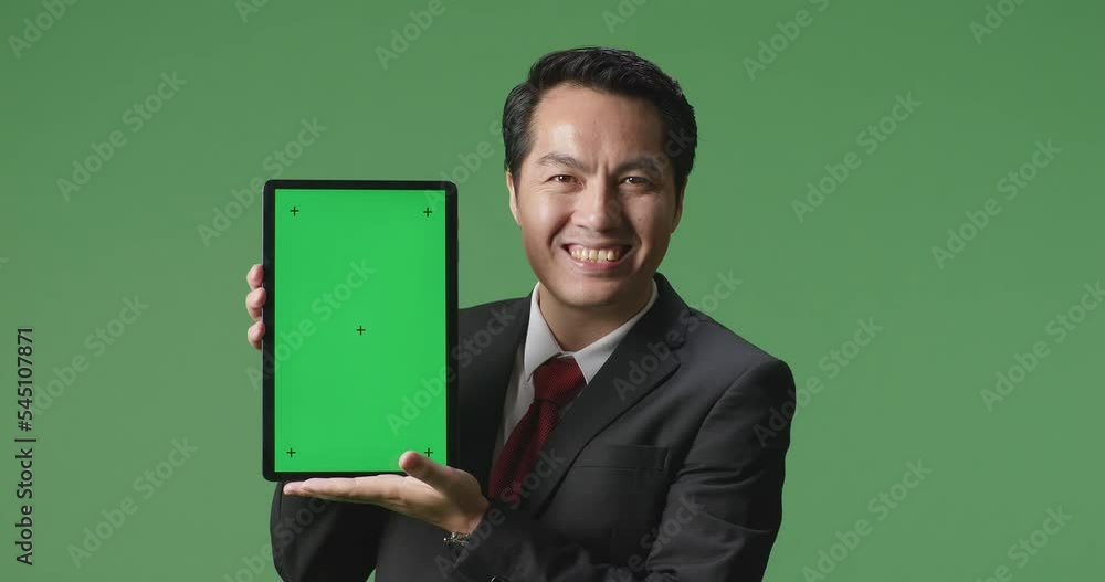 An Asian Business Man Showing Tablet Green Screen On Green Screen Background In The Studio
An Asian Business Man Showing Tablet Green Screen On Green Screen Background In The Studio