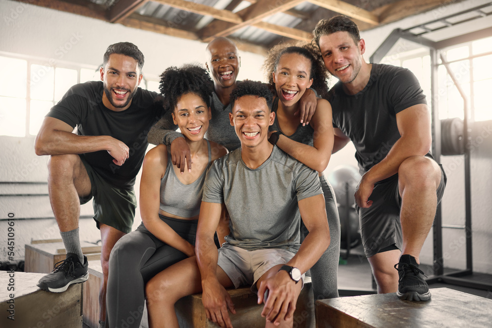 Fitness, portrait and friends happy to be at gym for a group workout  session, teamwork and training classes. Smile, community and healthy sports  people excited for cardio exercises with diversity Stock Photo