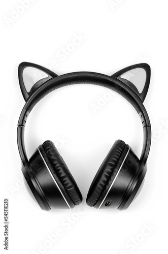 Black wireless headphones on a white background close-up, top view