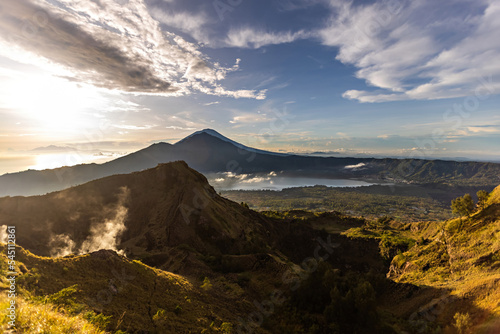 Breathtaking sunrise over Abang mountain  view from Batur volcano and Batur lake  Bali  Indonesia