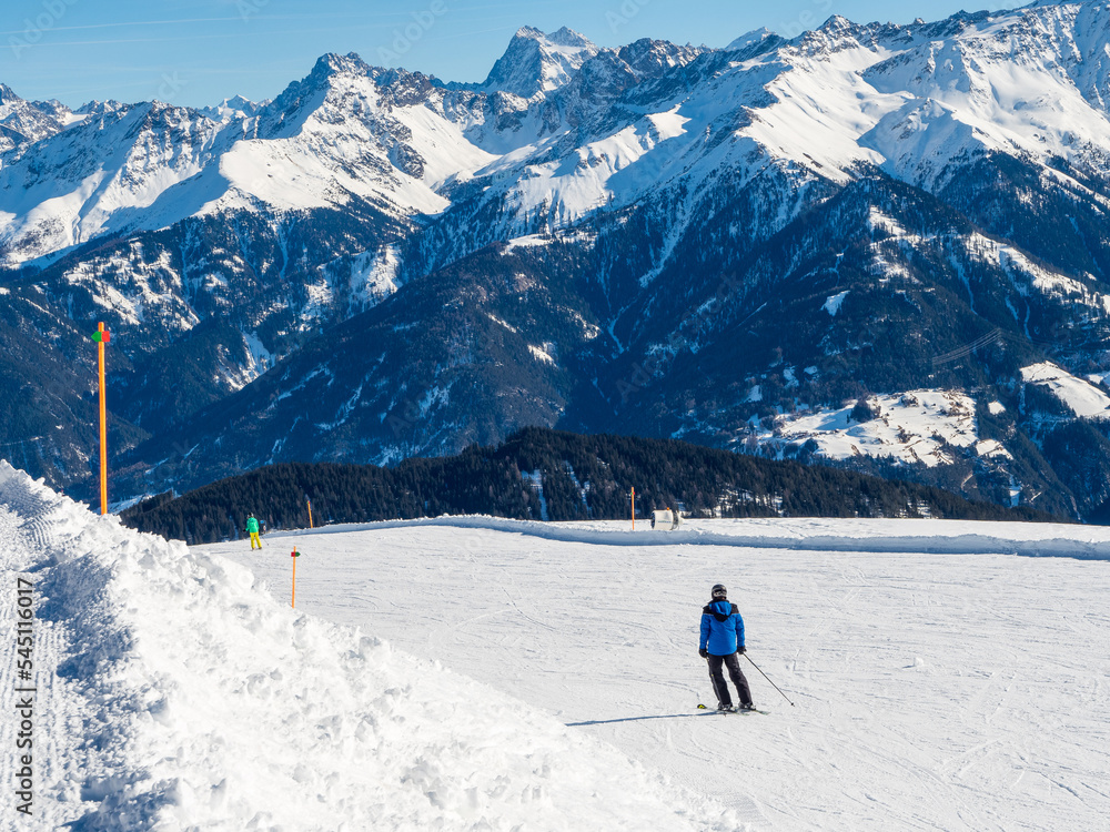 Panoramic view with skier in winter in resort Ladis, Fiss, Serfaus in ski resort in Tyrol.