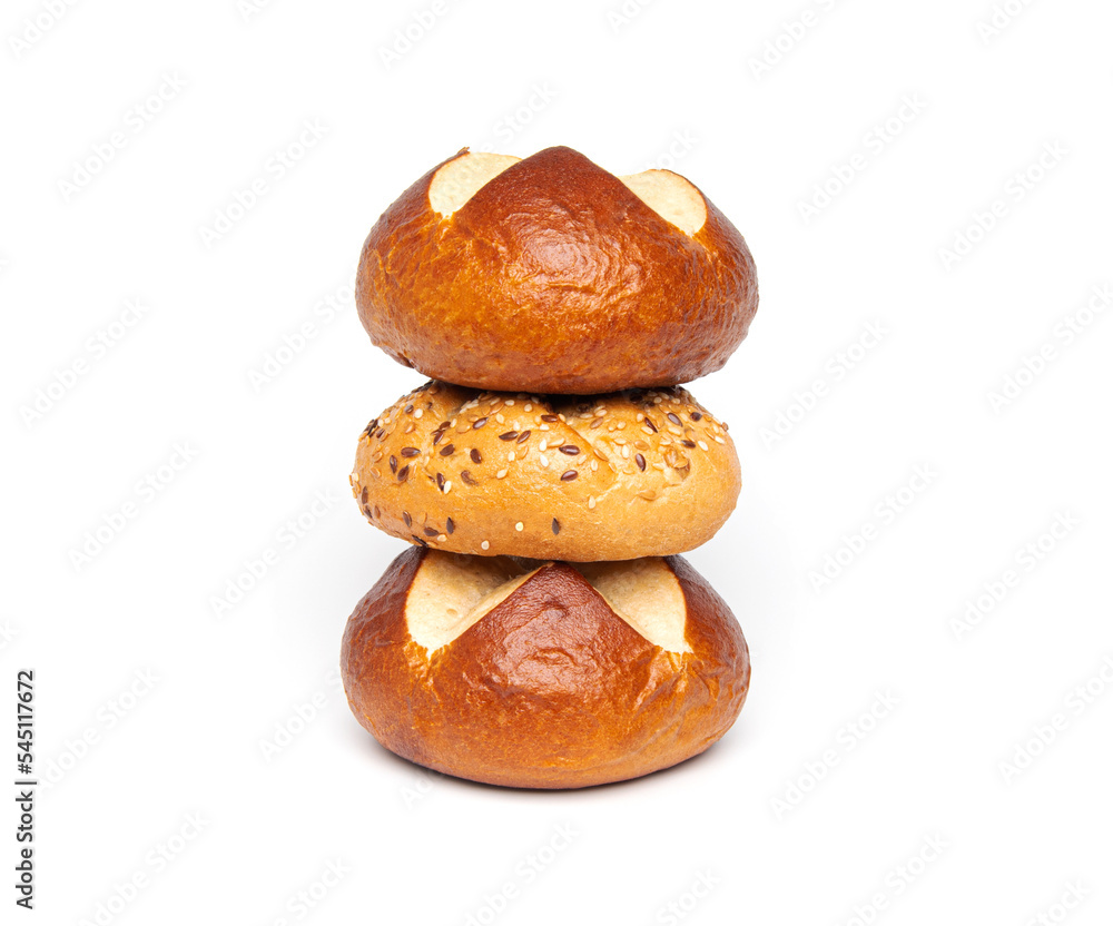 Bakery product assortment kaiser roll bun with linseeds and sesame, traditional German laugenbrot, Bavarian pretzel rolls lye bread isolated on a white background