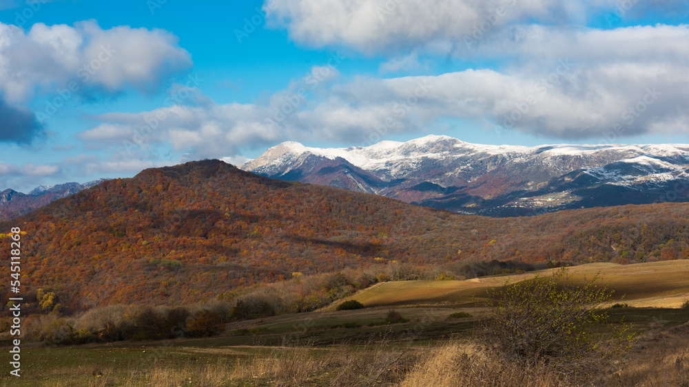 Wooded mountain ranges in autumn season