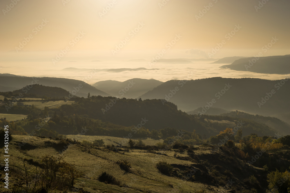 Landscape France Ardeche at Privas Creysseilles at dawn with fog clouds in the valleys
