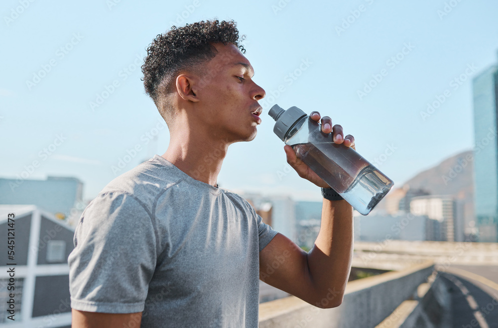 Fitness Man With Water Bottle Resting After Workout At Beach Stock Photo by  ©puhhha 109496632