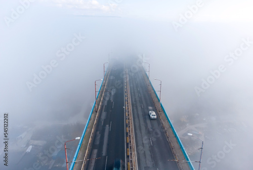 Aerial view of the Asparuhov bridge in the fog in the morning, Varna, Bulgaria photo