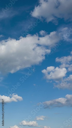 Beautiful time lapse of clouds flying in blue sky