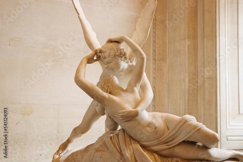 Fototapeta Marble Sculpture Called Psyche Revived By Cupid's Kiss On Display In The Louvre In Paris, France