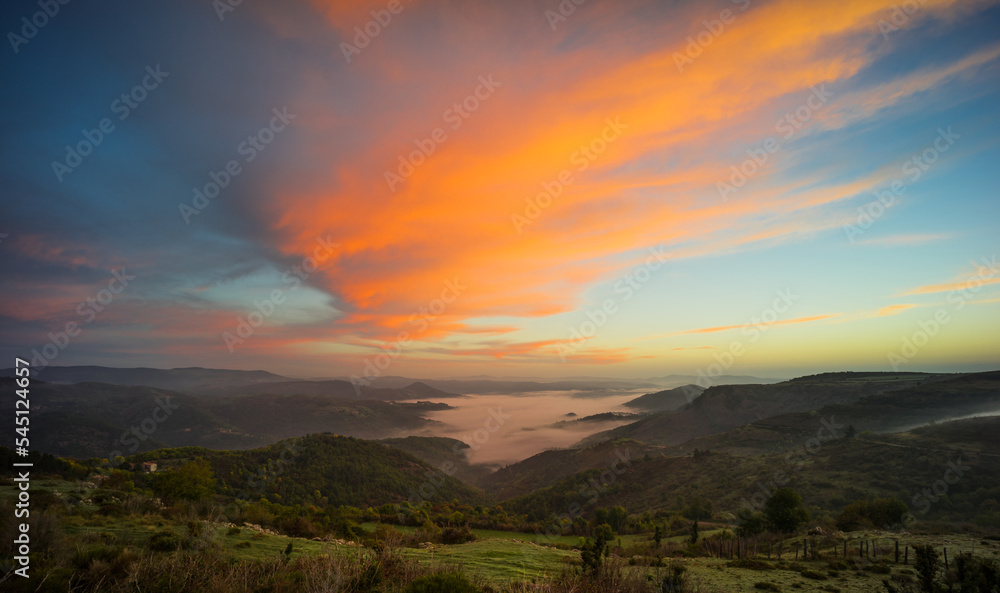 Landscape France Ardeche at Privas Creysseilles at dawn before sunrise with fog clouds in the valleys