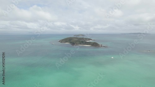 View Of Middle Island With Miall Island Behind And North Keppel Island In Distance. Keppel Islands In The Great Barrier Reef, Australia. wide aerial photo