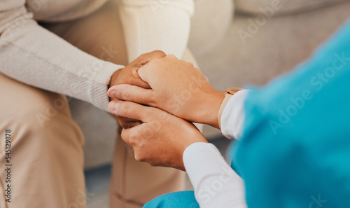 Holding hands, support and empathy with nurse and patient for trust, help and counseling in a nursing home. Woman and caregiver together for healthcare, psychology and consultation for depression