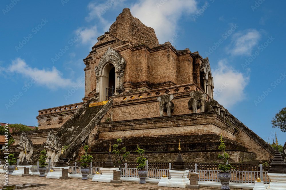 Wat Jed Yod, built in 1497, is a large active temple where monks live and study, and is seldom visited by foreigners. It is one of the ancient temples and translates to Seven Peaks Temple.