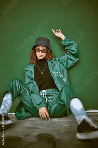 Fotografie Fashion, sunglasses and hip hop with black woman and wall with mockup for urban, gen z and luxury