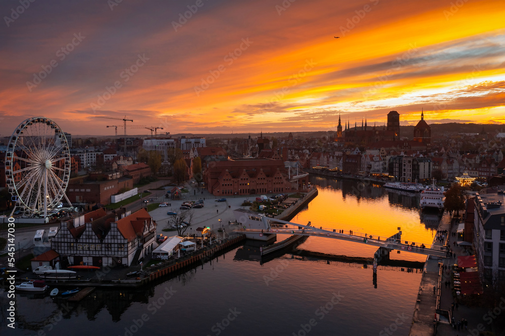Fototapeta premium Beautiful Gdansk city over the Motlawa river at sunset. Poland