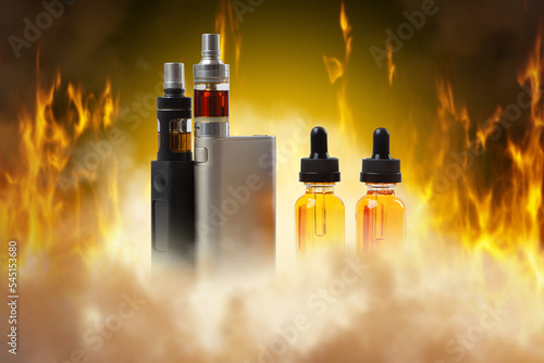 Vape juice and smoking devices. Bottles with vape juice near flame. Devices for vaping. Vape juice liquid. Vaper set with window and smoke. E-cigarette refills. Oil for vaping devices