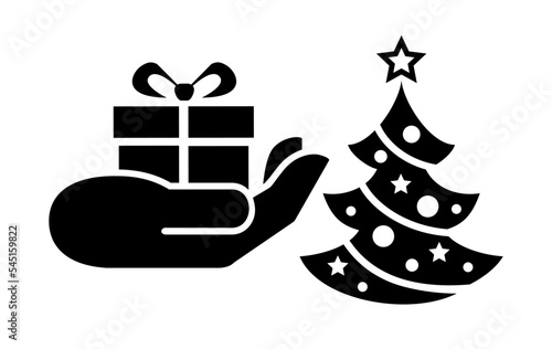 Hand putting present under Christmas tree. Christmas vector for web and print.