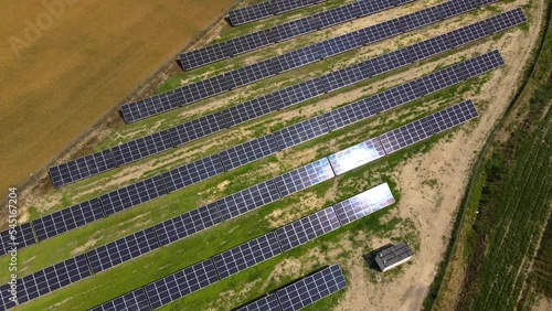 Aerial view, massive Solar panel farm on the field, alternative energy