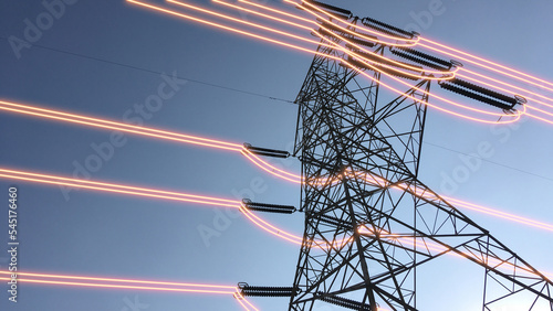 Electricity transmission towers with glowing wires