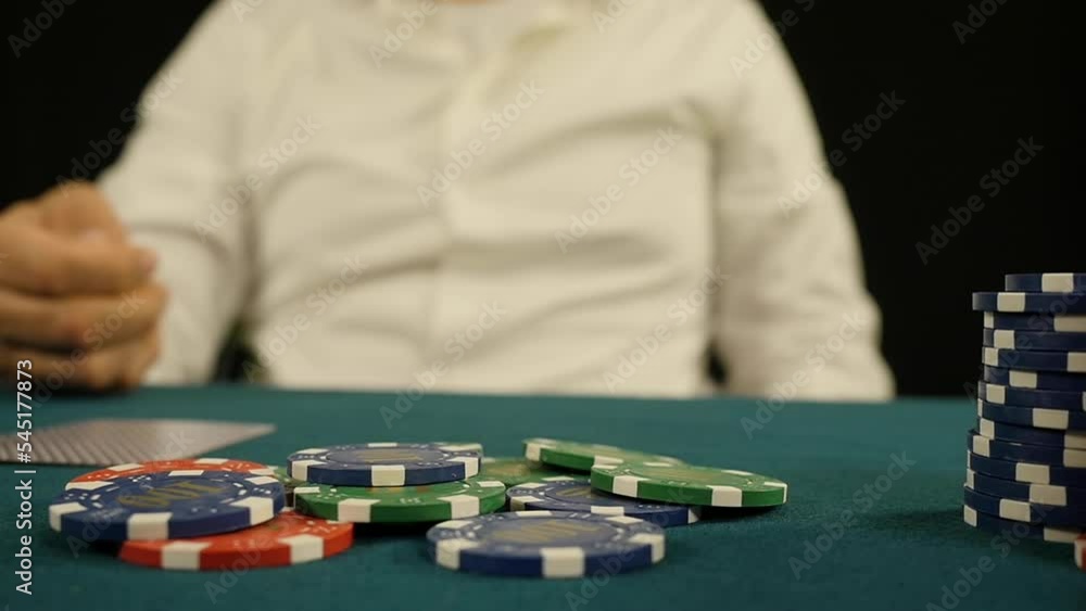 Poker player betting while playing Texas Holdem in casino, Slow motion Poker player betting while playing Texas Holdem in casino, Slow motion