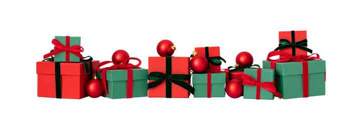 Christmas gifts and baubles isolated on a transparent background. Red and green gift boxes. New Year surprise.