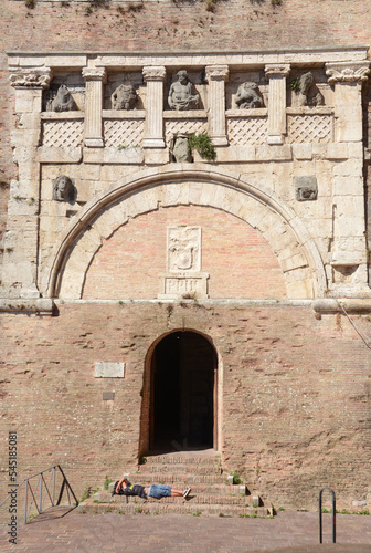  the Marzia gate which is one of the ancient gates of the Etruscan walls of the city of Perugia and is located near the Lomellina fountain which has been recently restored. photo