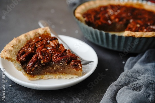 Homemade Pecan Pie - Thanksgiving holiday dessert, selective focus