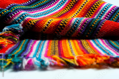 Detail of handmade textile by Mayan Indians in Guatemala, colorful cotton, ancestral cosmology. © Byron Ortiz