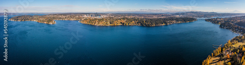 aerial panoramic landscape view across Lake Washington and Meydenbauer Bay to Bellevue Downtown with its skyscrapers during autumn season - Bird eye view 