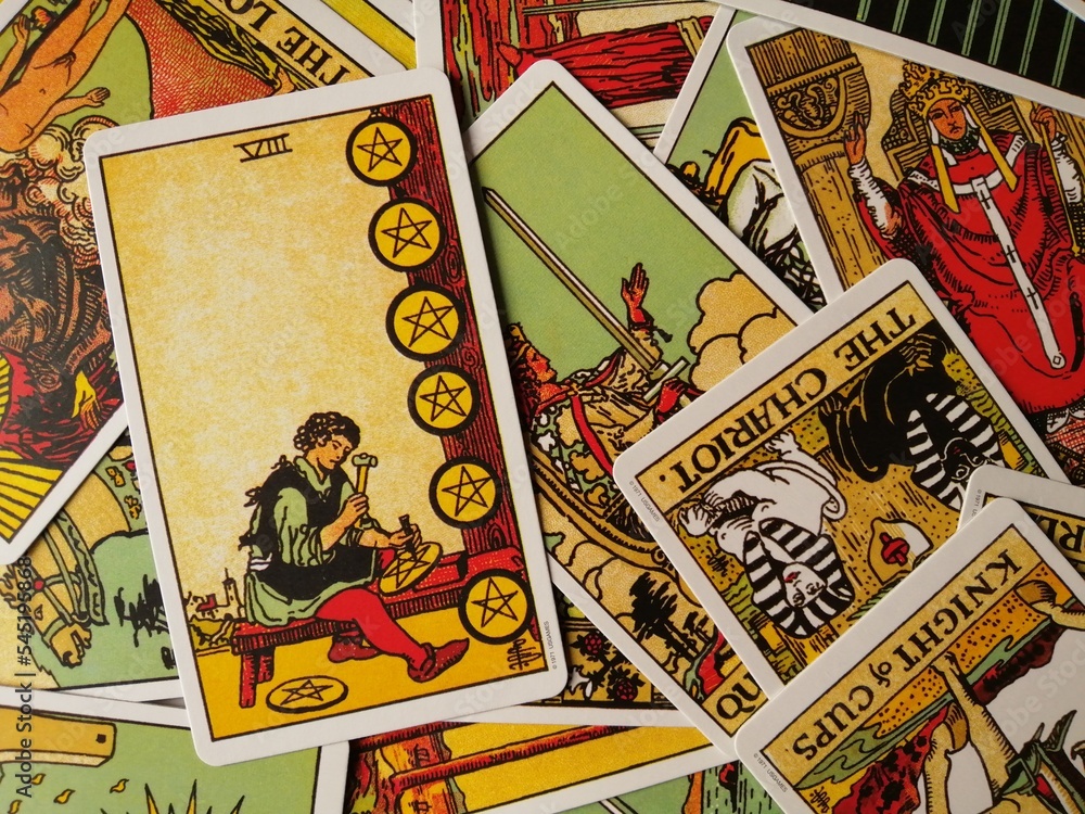 Picture of the Eight of Pentacles tarot card from the original Rider Waite tarot deck with mixed tarot cards in the background