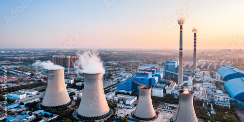 Aerial photography of coal-fired thermal power plants at dusk in Hohhot, Inner Mongolia, China photo