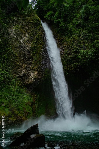 Vertical shot of a waterfall in Arenal, Costa Rica