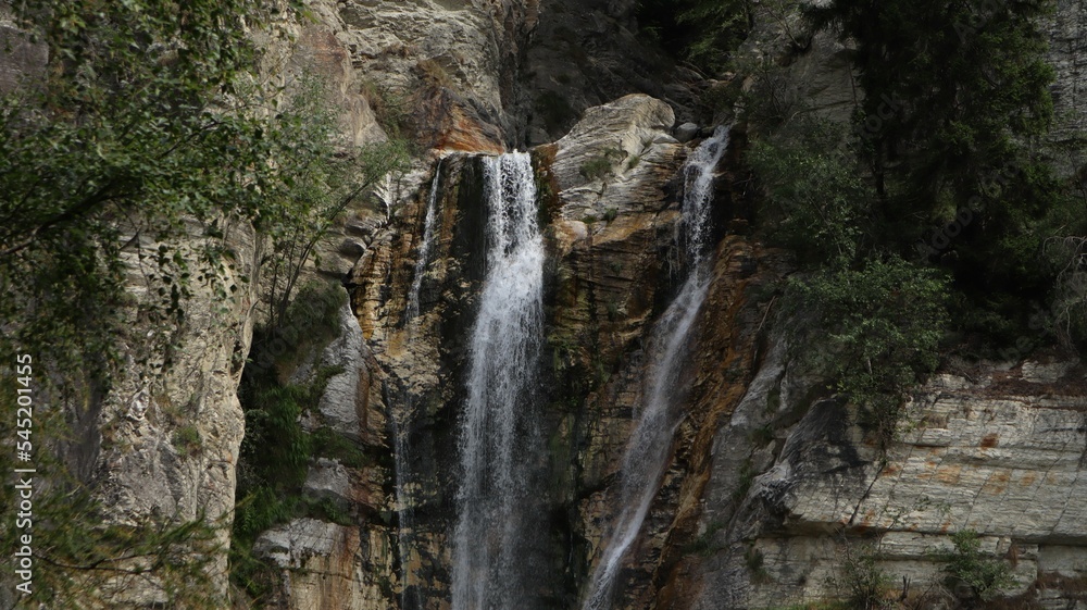 Obraz premium Rocky waterfall in the forest