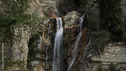 Rocky waterfall in the forest © Freakout Fpv/Wirestock Creators