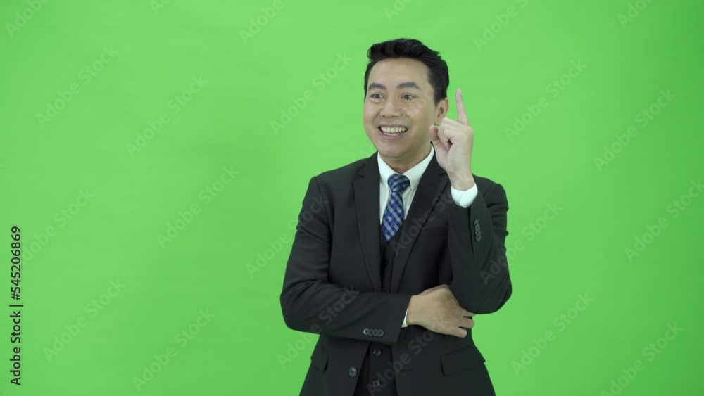 Asian businessman portrait on green screen. Asian businessman portrait on green screen.