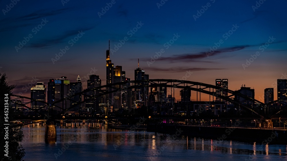 Beautiful shot of Osthafenbrucke bridge during the evening in  Frankfurt, Germany