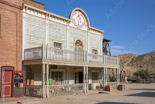 View at the Oasys - Mini Hollywood, a Spanish Western-styled theme park, Western saloon main exterior facade, town with traditional stores, Alméria Taberna desert photo