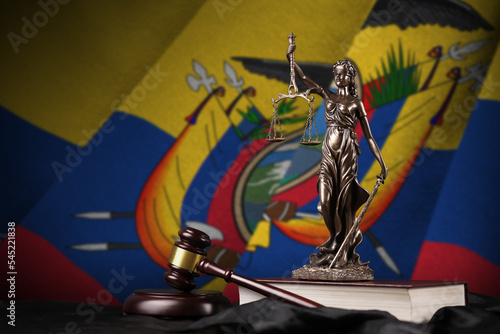 Ecuador flag with statue of lady justice, constitution and judge hammer on black drapery. Concept of judgement and guilt