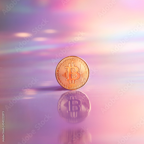 Golden bitcoin coin on holographic, abstract, neon background. digital currency, business style. Mining and trade bitcoin concept. square photo