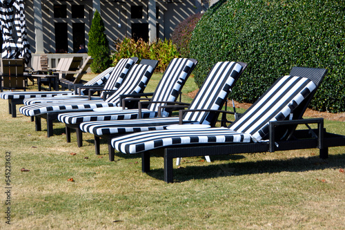 Empty lounge chairs at hotel resort