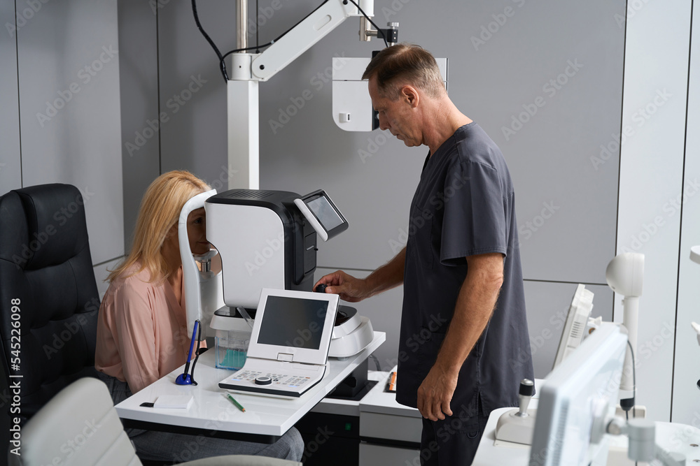 Woman is having diagnostics in ophthalmological clinic