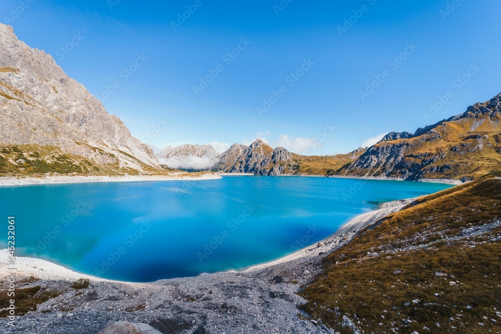 Scenic view of Lunersee Lake surrounded by mountains in Vorarlberg, Austria