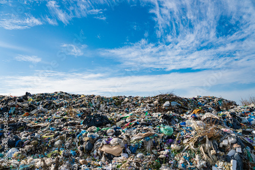 Garbage pile in trash dump or landfill. Ecological damage contaminated land.