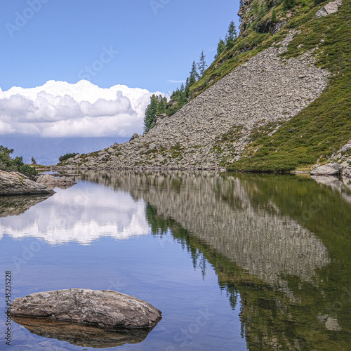 View of Spiegelsee [Mirror lake] as seen on the trial from Rippetegg summit back to Rieteralm, Schladming, Styria, Austria photo