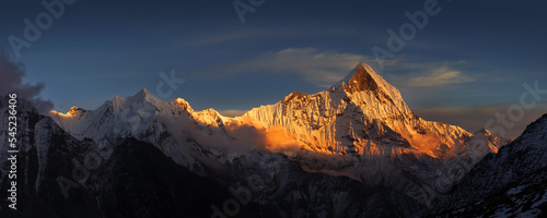 Panoramic view of the Mt. Machapuchare at sunset from Annapurna base camp. Himalaya mountains, Nepal.