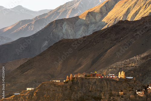 Old tibetan Jhong (Dzong) village near Muktinath in sunny winter evening. Annapurna circuit / Jomsom trek, Nepal. photo