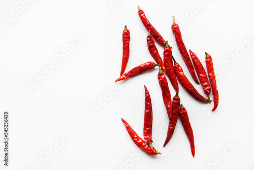 Red hot capsicum on a white background. Red pepper close-up.